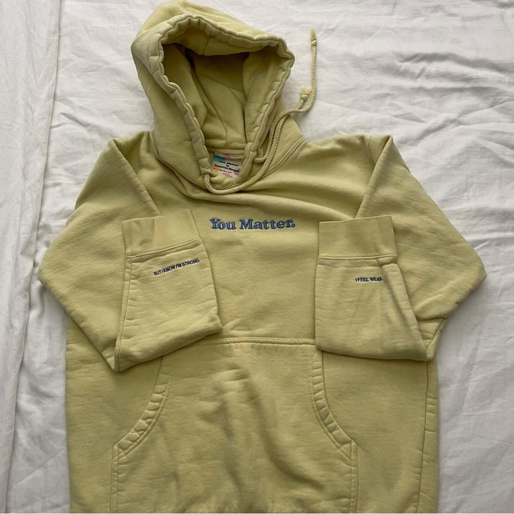 Yellow You Matter hoodie by Demetrius Harmon